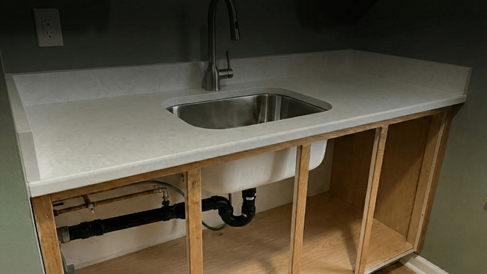 plumbing job of a new sink installation